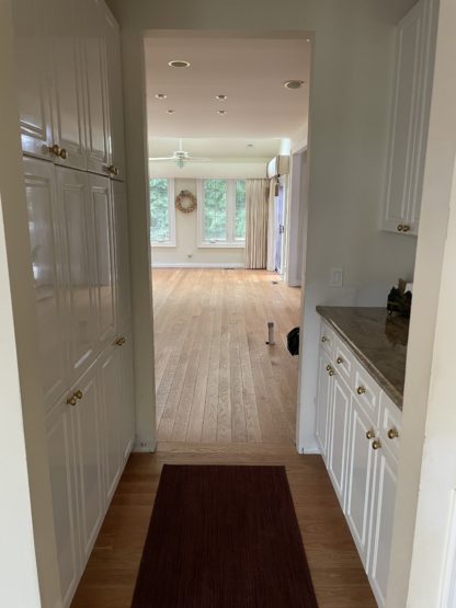 cherry floor white kitchen