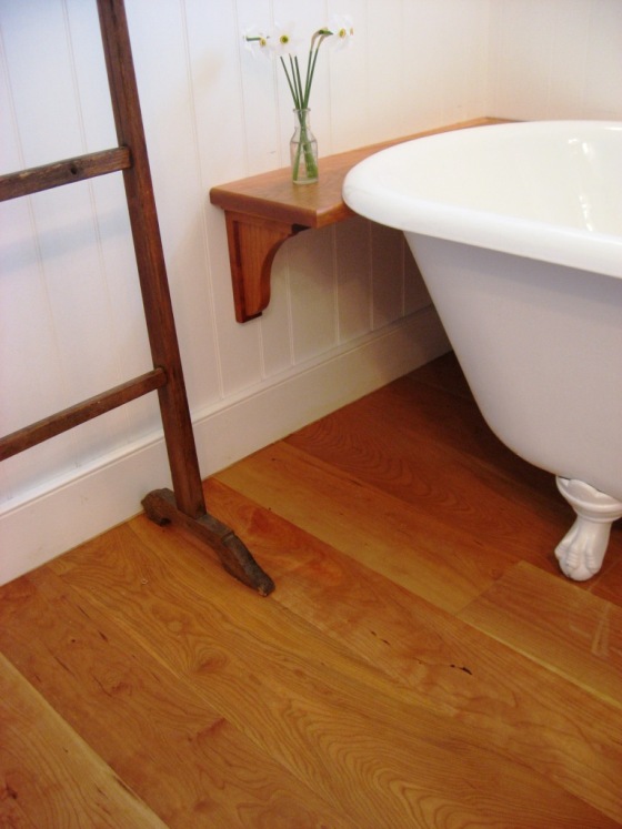 cherry wide plank bathroom flooring and tongue and groove wall paneling