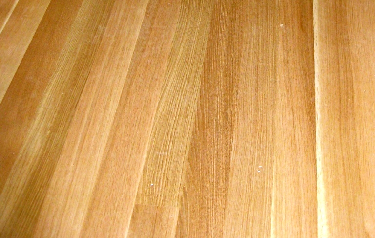 Close-up view of the grain of rift sawn White Oak wood flooring.