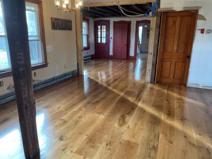 New wood floor to match vintage farmhouse